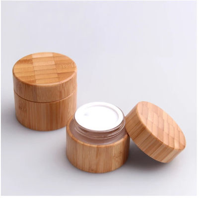 Verre intérieur de bouteille ronde de conteneur d'emballage cosmétique en bambou naturel en bois de pot