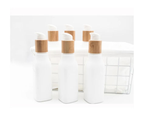 Conteneur cosmétique lisse de lotion de bouteille en verre d'OPL et pot crème avec le couvercle en bois