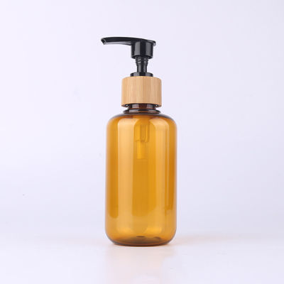 Amber Glass Bamboo Cosmetic Bottle avec le pulvérisateur en bois de lotion de gravure de chapeau