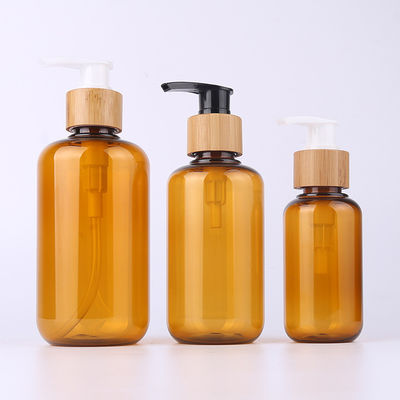Amber Glass Bamboo Cosmetic Bottle avec le pulvérisateur en bois de lotion de gravure de chapeau