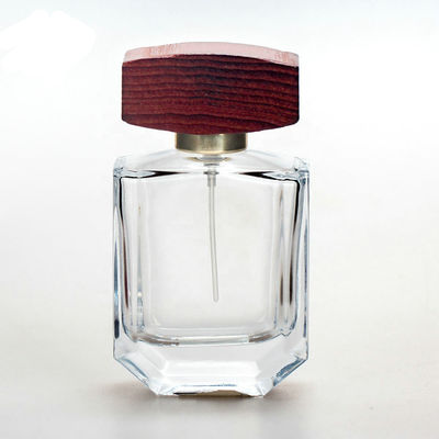 bouteille de parfum en verre de l'espace libre 50ml avec les chapeaux en bois de collarwith de jet de chapeau et de pompe