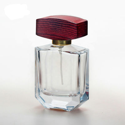 bouteille de parfum en verre de l'espace libre 50ml avec les chapeaux en bois de collarwith de jet de chapeau et de pompe