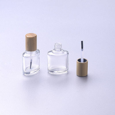 la bouteille polonaise en verre 15ml d'ongle vide avec le chapeau en bois en bambou de brosse composent
