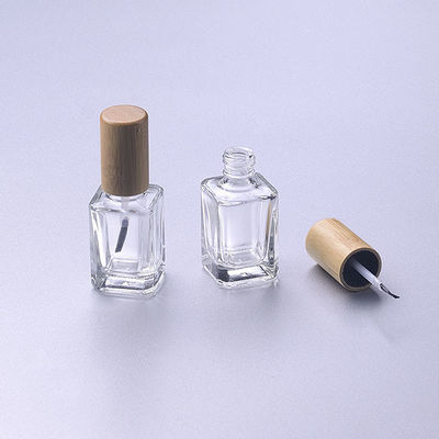 la bouteille polonaise en verre 15ml d'ongle vide avec le chapeau en bois en bambou de brosse composent