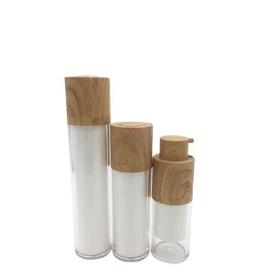 Bouteille cosmétique de lotion pompe à vide privée d'air en bambou rotatoire blanche chaude de vente de double