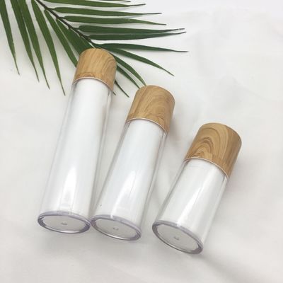 Bouteille cosmétique de lotion pompe à vide privée d'air en bambou rotatoire blanche chaude de vente de double