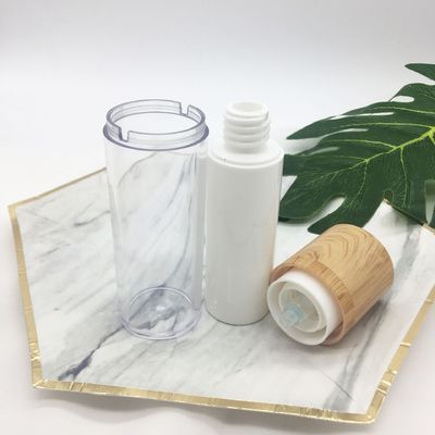 Bouteille cosmétique de lotion pompe à vide privée d'air en bambou rotatoire blanche chaude de vente de double