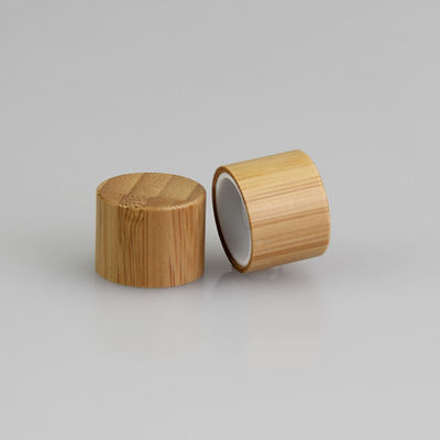 le couvercle à visser 28mm en bambou de 24mm pour les fermetures supérieures de disque cosmétique de bouteille écrèment la capsule