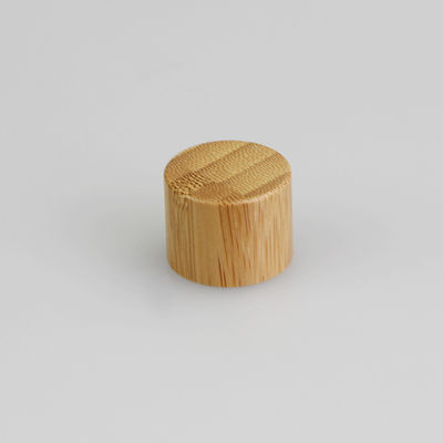 le couvercle à visser 28mm en bambou de 24mm pour les fermetures supérieures de disque cosmétique de bouteille écrèment la capsule