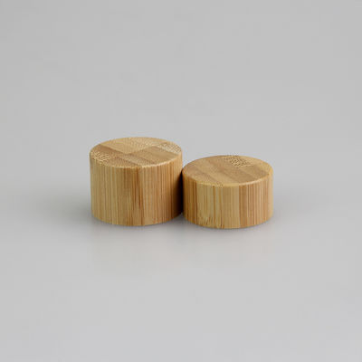 le couvercle à visser 28mm en bambou de 24mm pour les fermetures supérieures de disque cosmétique de bouteille écrèment la capsule