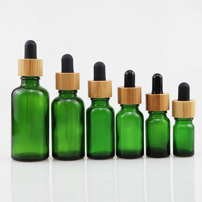 bouteille cosmétique en verre de l'huile 100ml essentielle avec la peau en bambou Brown de soin de compte-gouttes