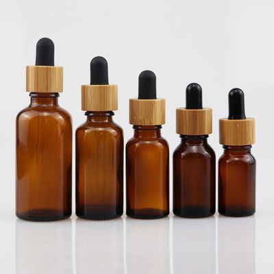 bouteille cosmétique en verre de l'huile 100ml essentielle avec la peau en bambou Brown de soin de compte-gouttes