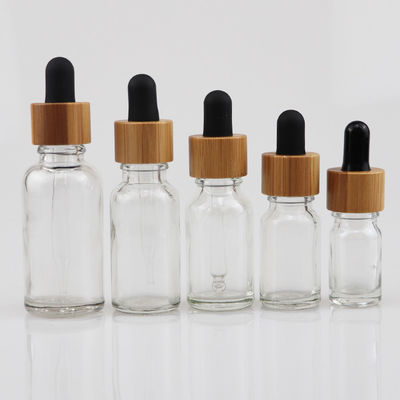 bouteille cosmétique en verre de l'huile 100ml essentielle avec la peau en bambou Brown de soin de compte-gouttes