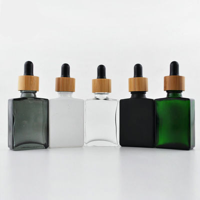 Bouteille en verre cosmétique du compte-gouttes 30ml de rectangle avec le chapeau en bambou pour l'huile essentielle
