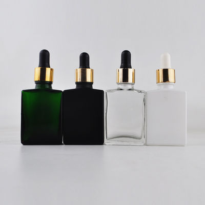 Bouteille en verre cosmétique du compte-gouttes 30ml de rectangle avec le chapeau en bambou pour l'huile essentielle