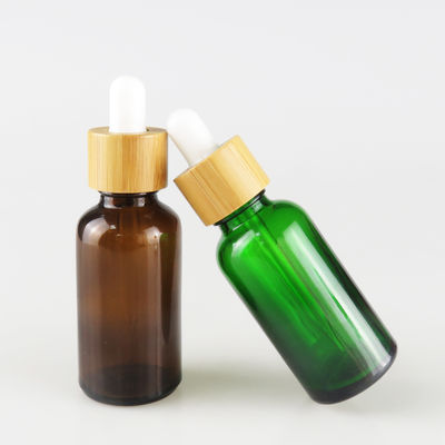 Bouteille en verre d'huile essentielle avec la petite bouteille d'huile de compte-gouttes résistant en bambou d'enfant